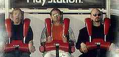 Three mad people on the Playstation ride at Blackpool.